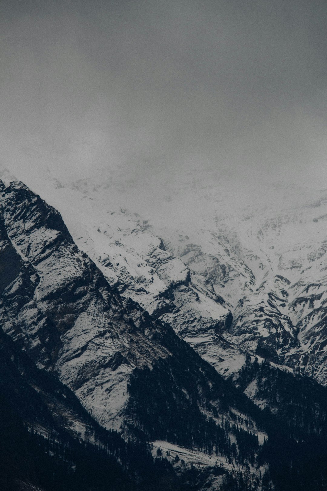 snow covered mountain during daytime