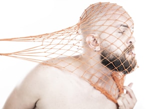 a man being "drawn" by a net