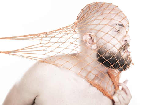 a man being "drawn" by a net