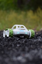 a toy car that is sitting in the road