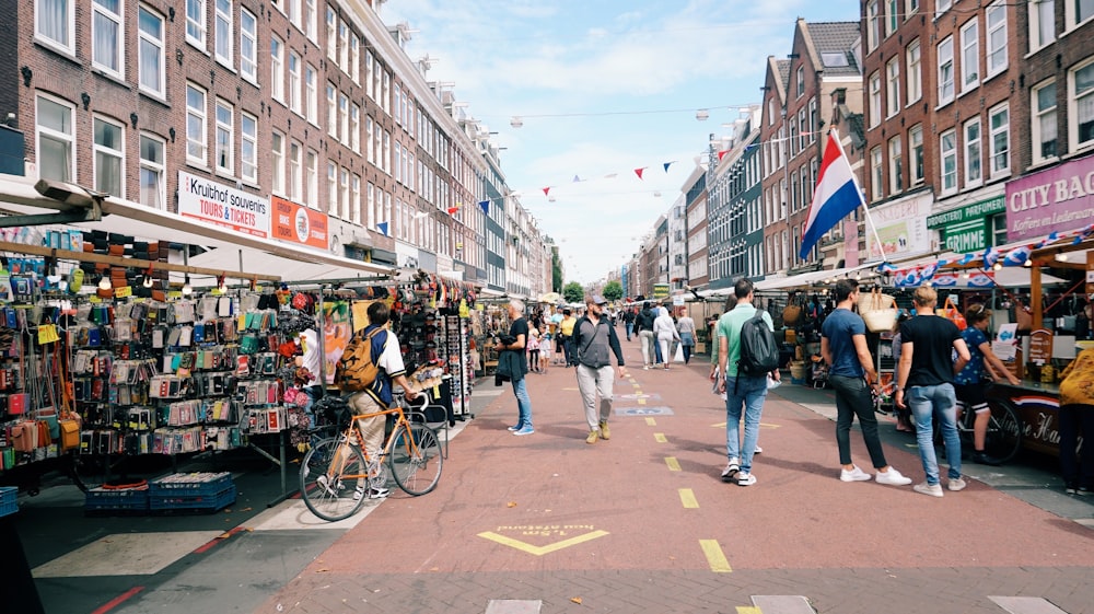 people walking on pedestrian lane during daytime