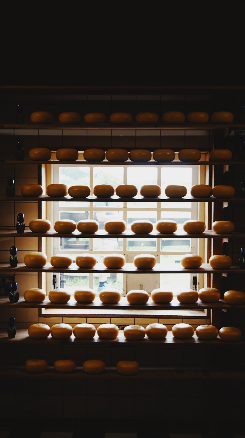 brown wooden shelf with bottles