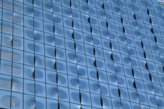 Close-up of a modern glass building facade with safety films applied