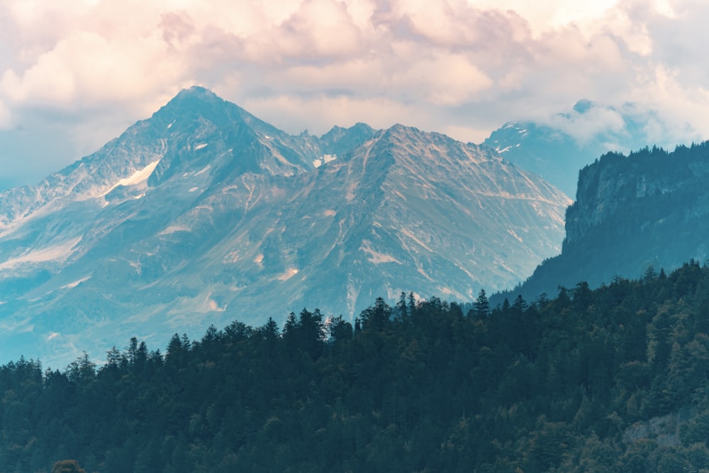 snow covered mountain during daytime