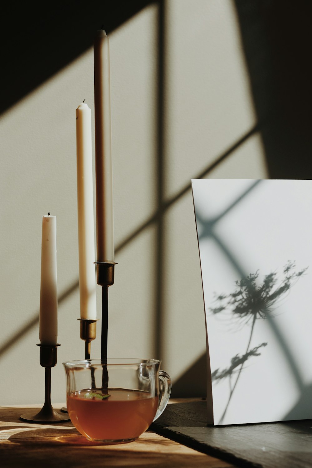 white and brown stick on glass holder