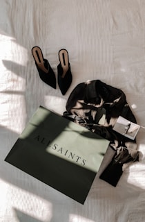 black and brown leather flip flops
