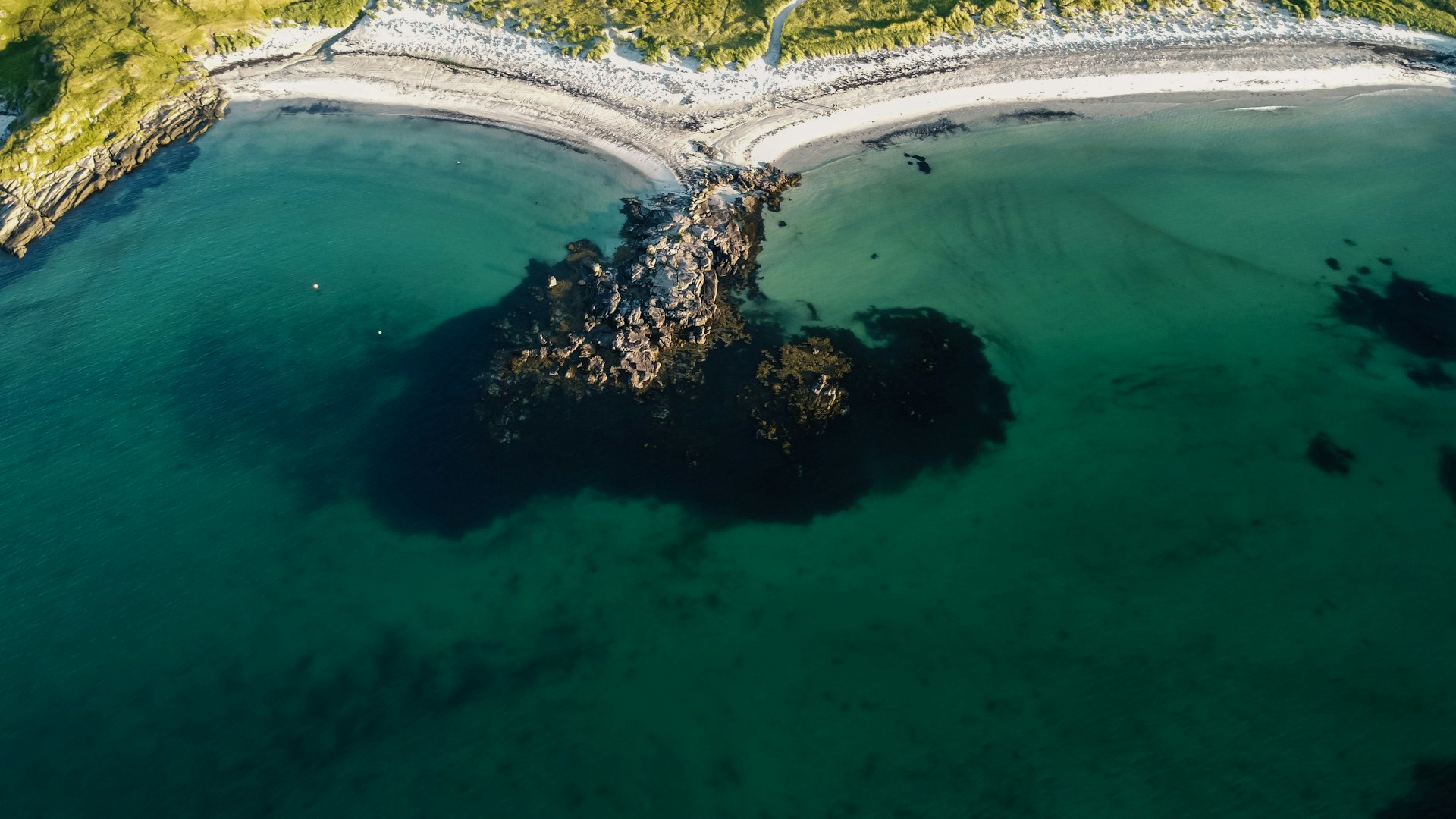 aerial view of green body of water during daytime