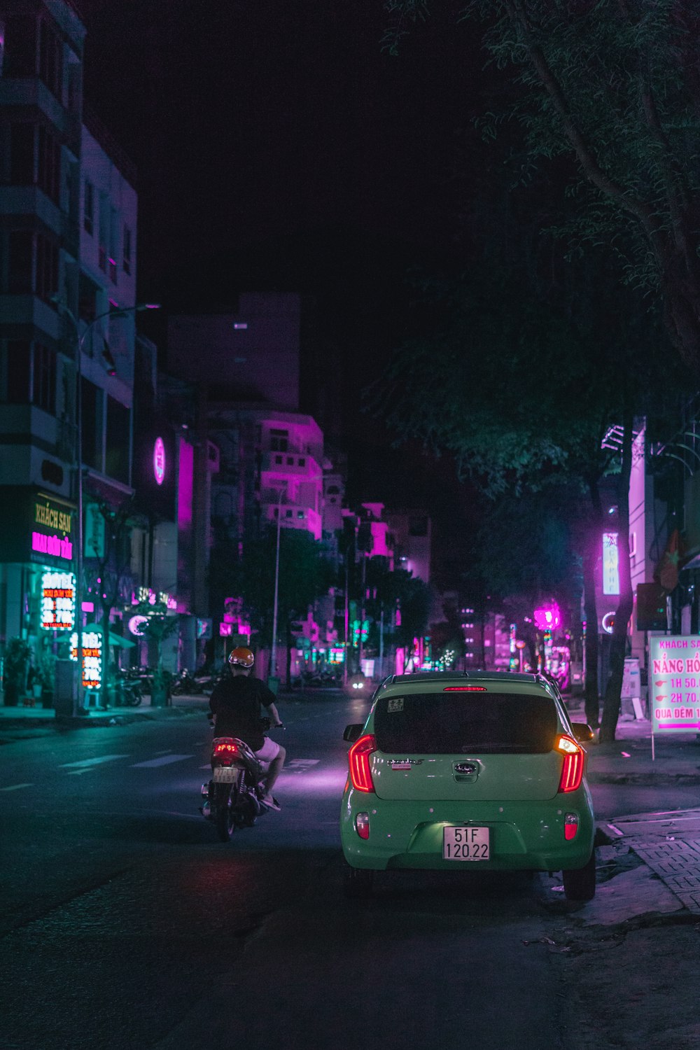 people walking on pedestrian lane during night time