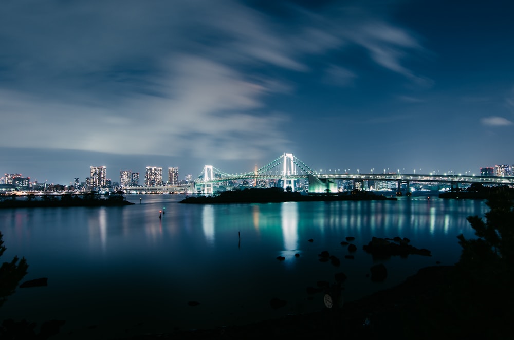 bridge over water during night time