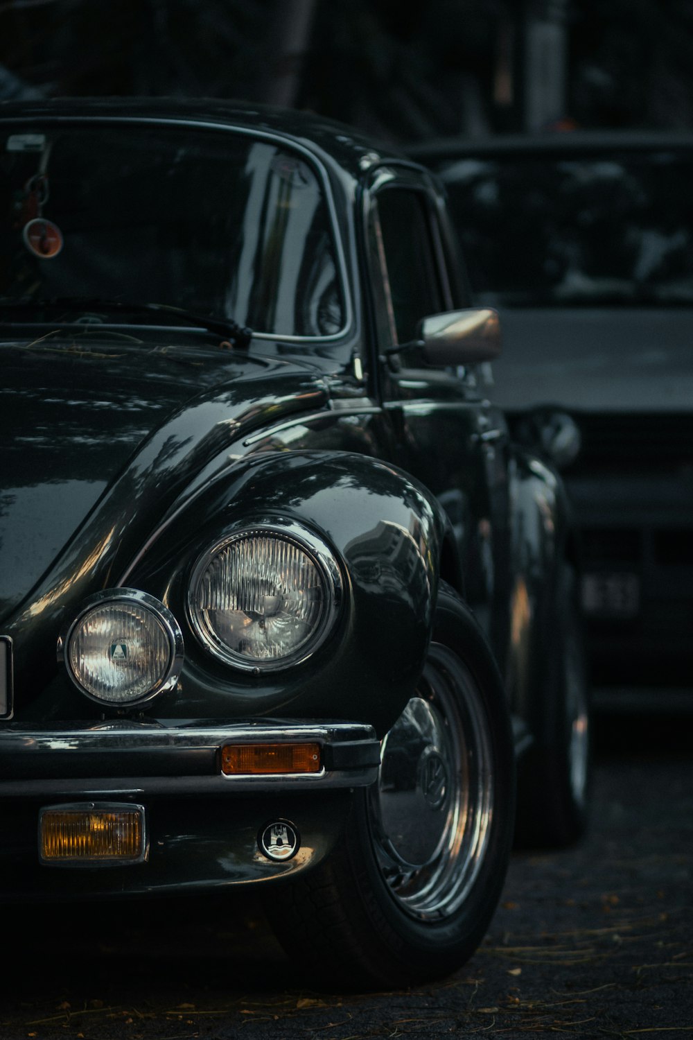 black classic car in grayscale photography