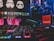 A gaming setup featuring a Samsung monitor displaying graphics of stormtrooper helmets and various software icons. Below the monitor, there is a colorful RGB-backlit keyboard. On the right side, a Redragon mousepad is visible next to a gaming mouse lit with neon colors. In the background, parts of a computer with a Gigabyte graphics card and RGB lighting are seen.