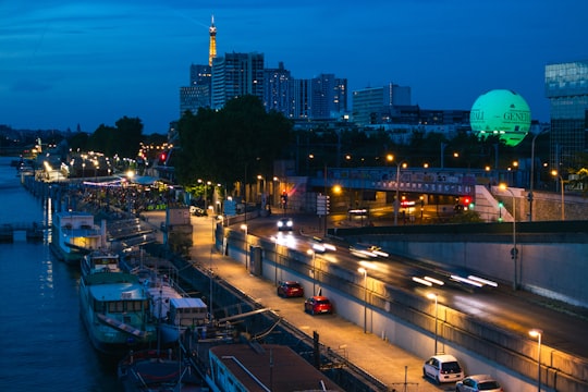 cars on road during night time in Paris 15 France