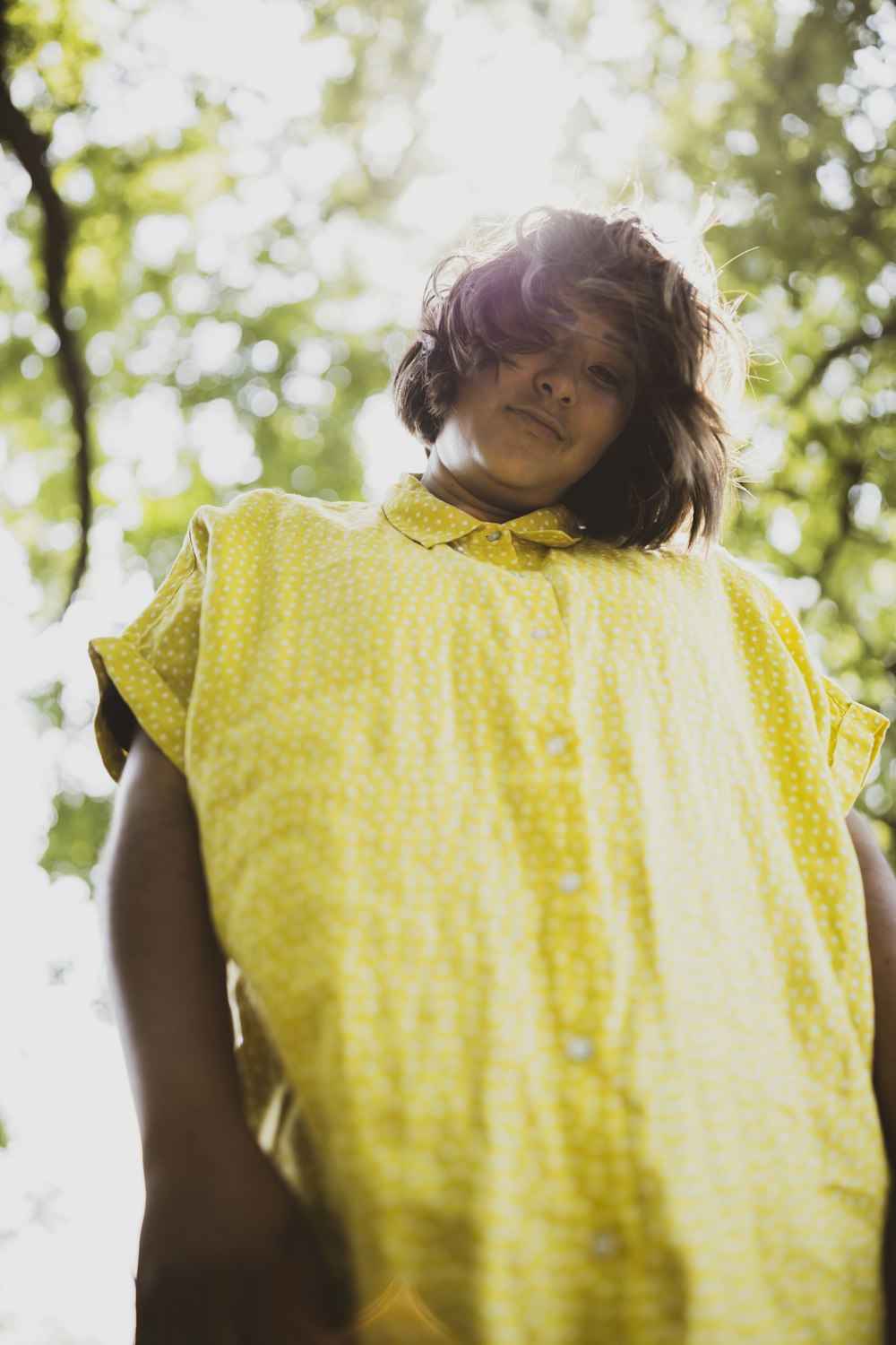 girl in yellow sleeveless dress