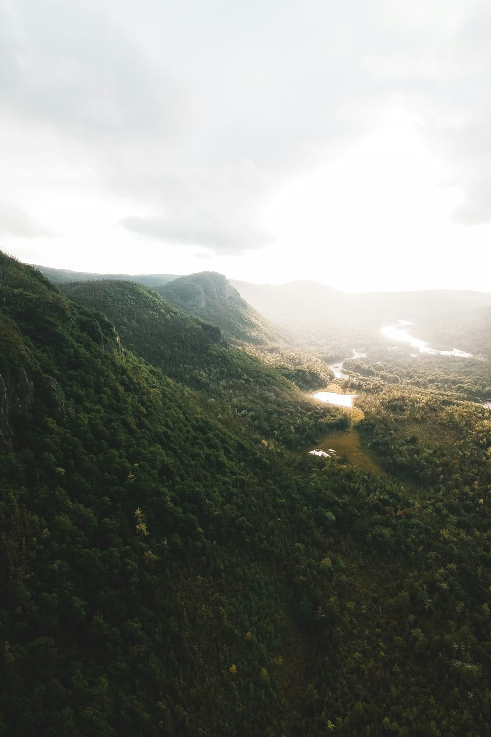 green mountains under white sky during daytime