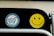 a close up of a traffic light with a smiley face