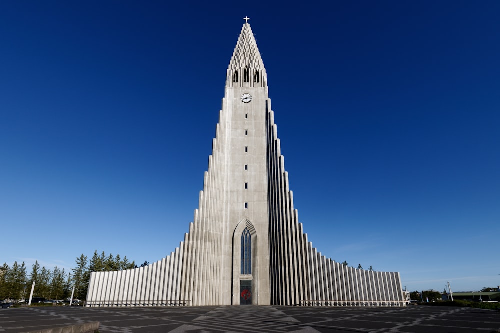 white concrete building under blue sky during daytime