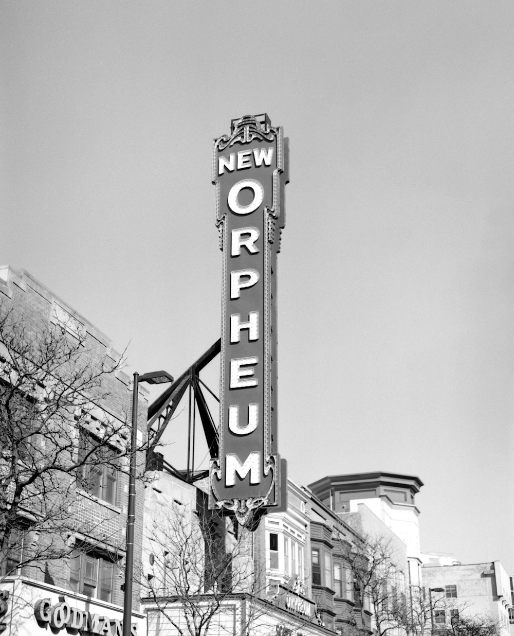 a black and white photo of a new orleans sign