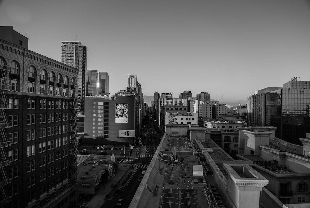 grayscale photo of city buildings