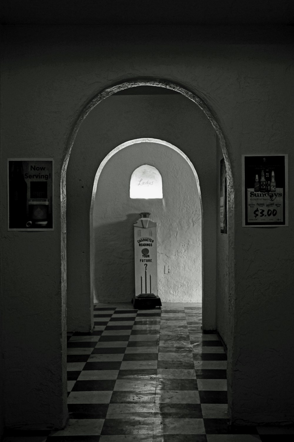 grayscale photo of hallway with no people