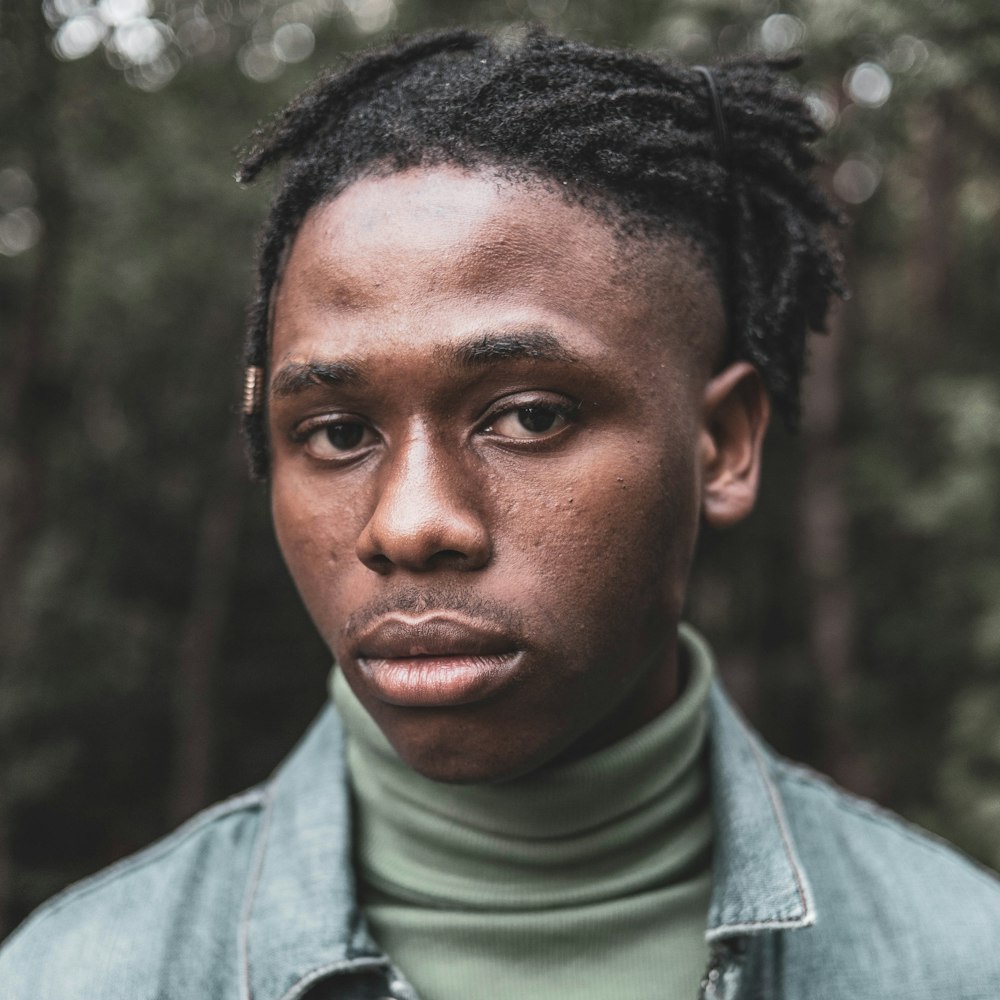 man in gray collared shirt