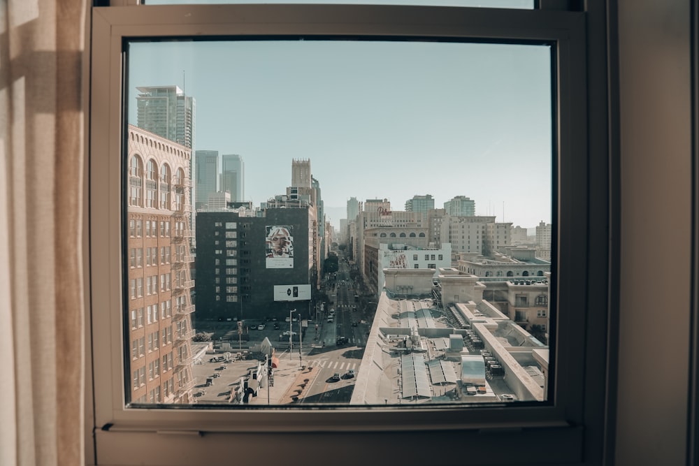 brown wooden framed glass window