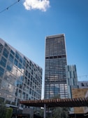 white and blue concrete building under blue sky during daytime