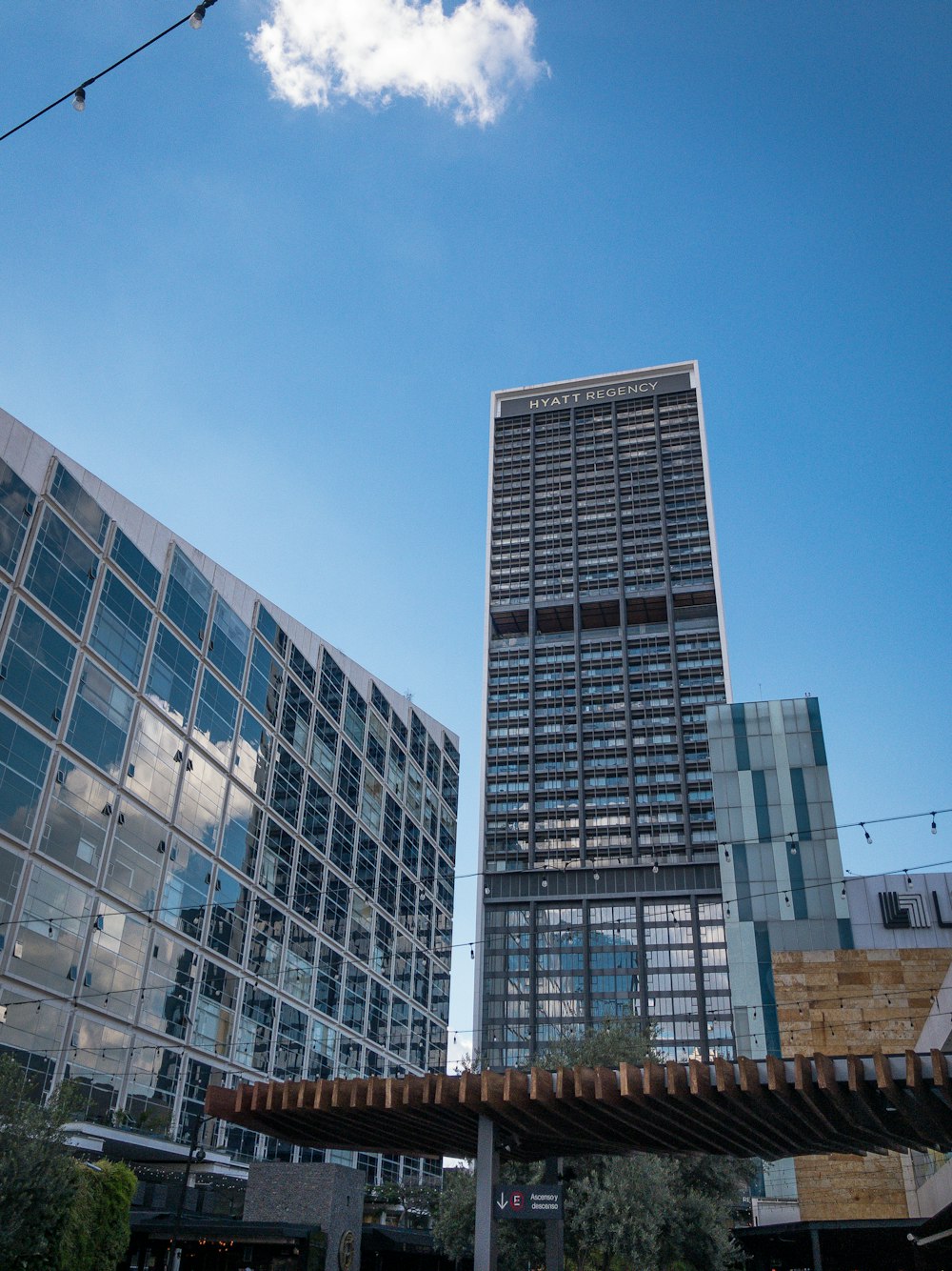 white and blue concrete building under blue sky during daytime