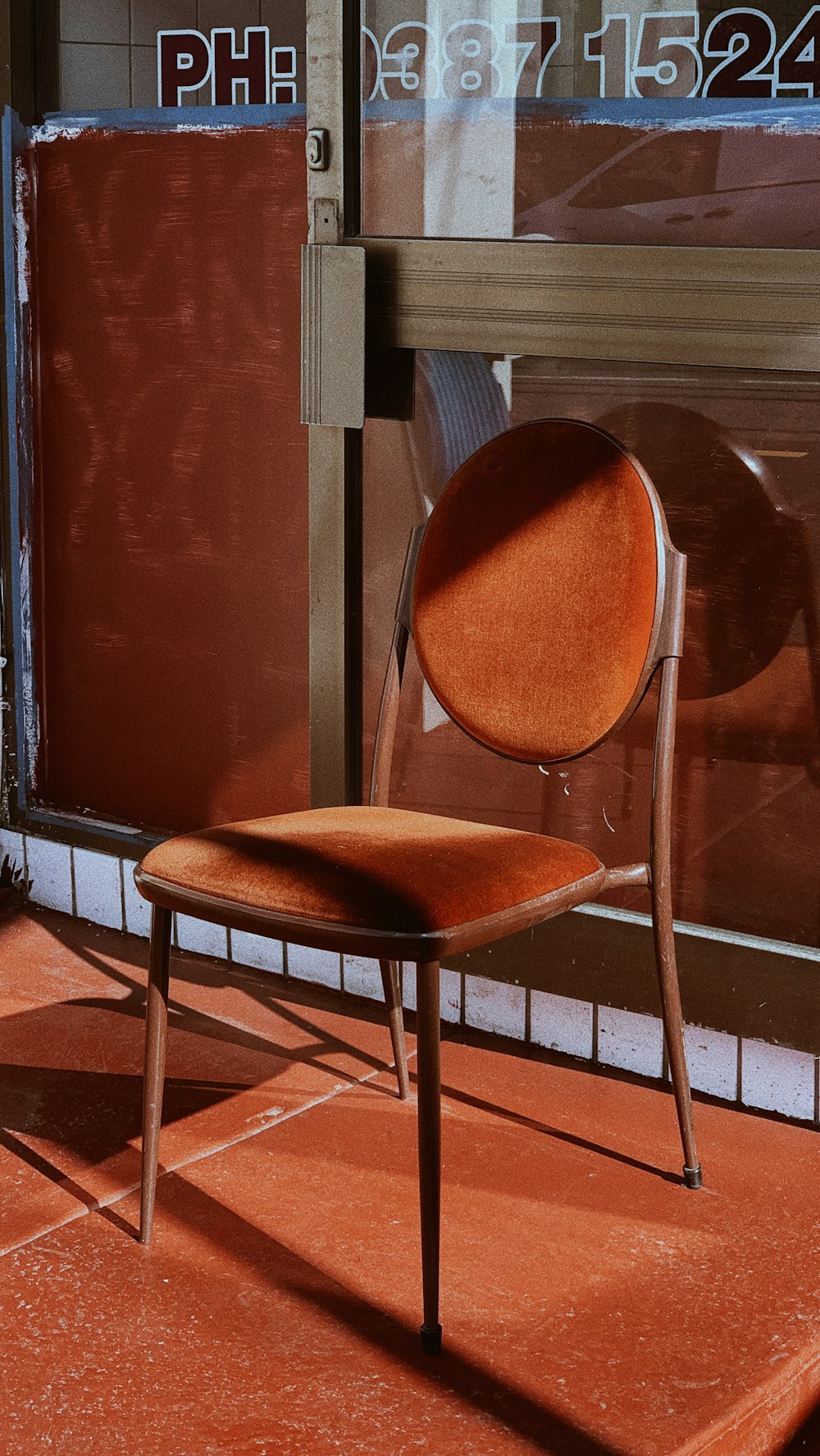 brown wooden chair near brown wooden door