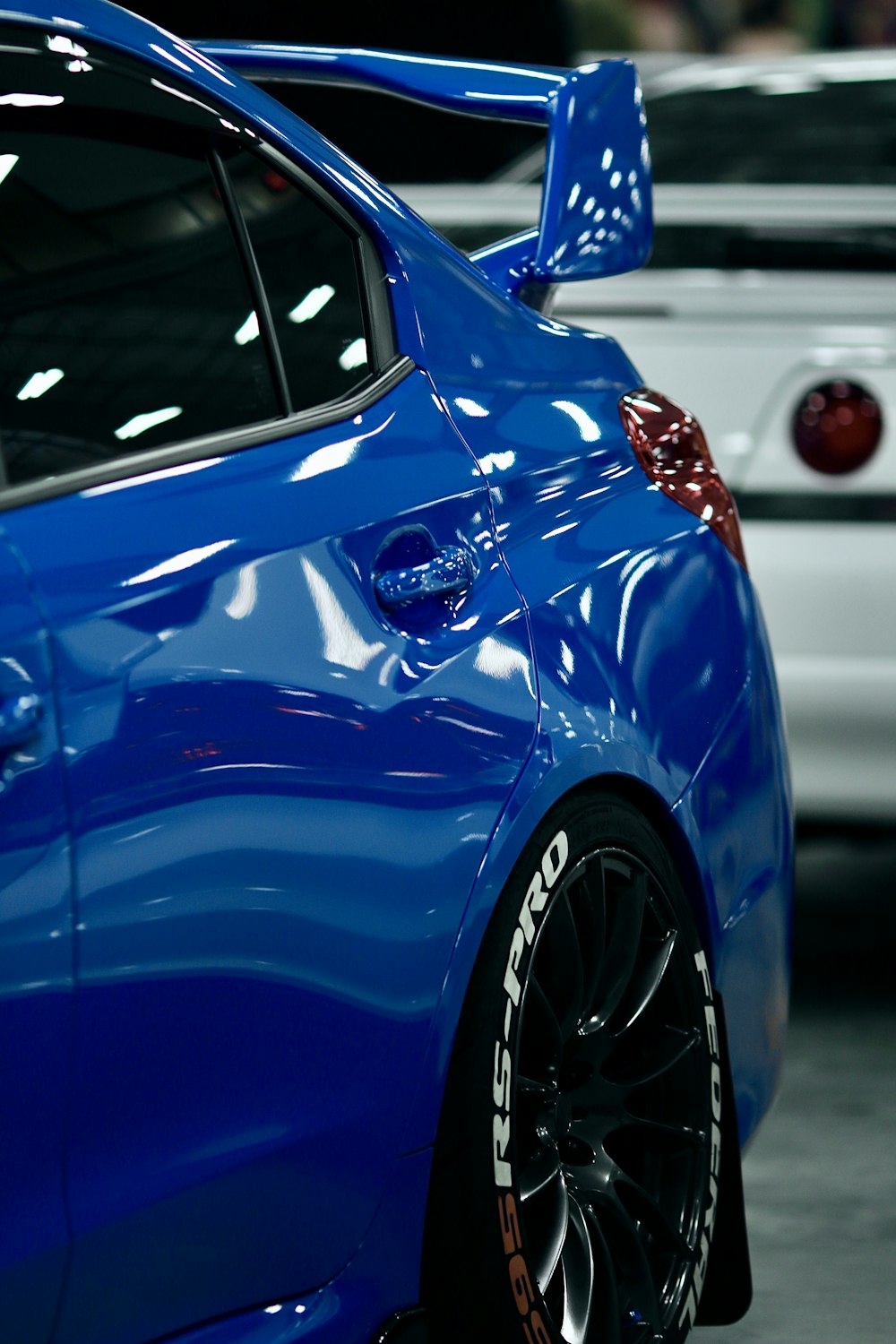 blue car on road during daytime