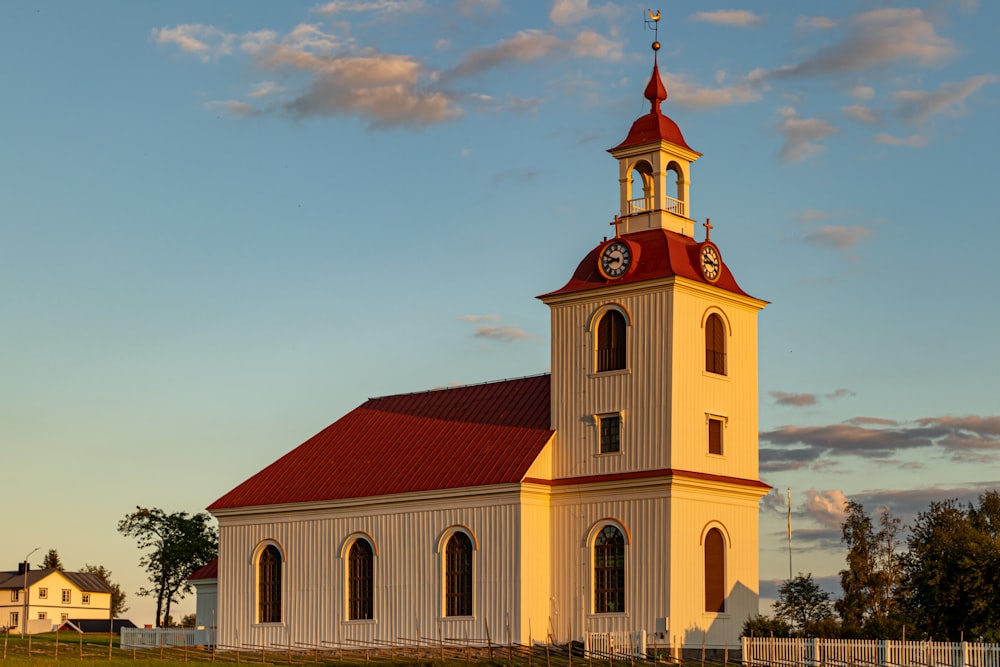 white and brown concrete church under blue sky during daytime