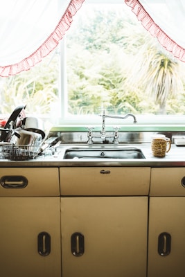Stainless steel sink and water fixtures