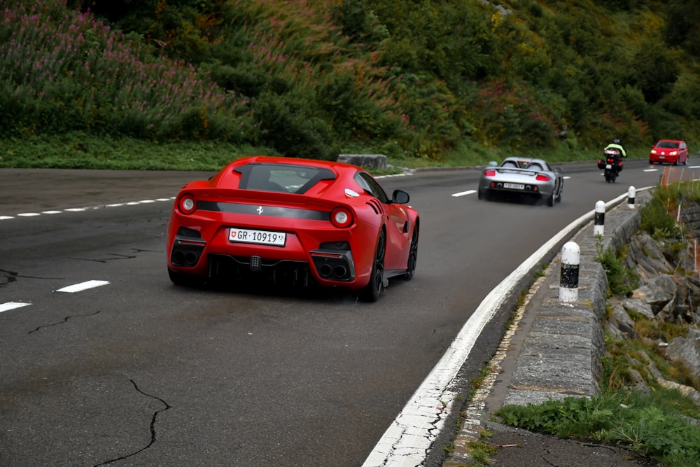 red porsche 911 on road during daytime