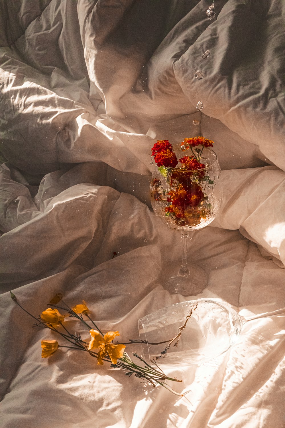 red and gold bouquet on white textile