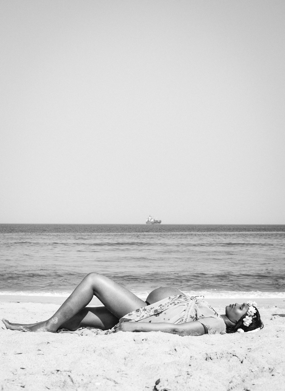 woman in bikini lying on beach