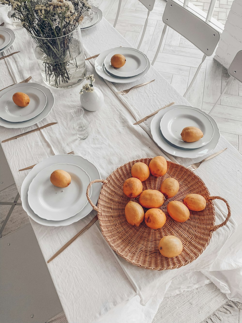 orange fruits on white ceramic plate