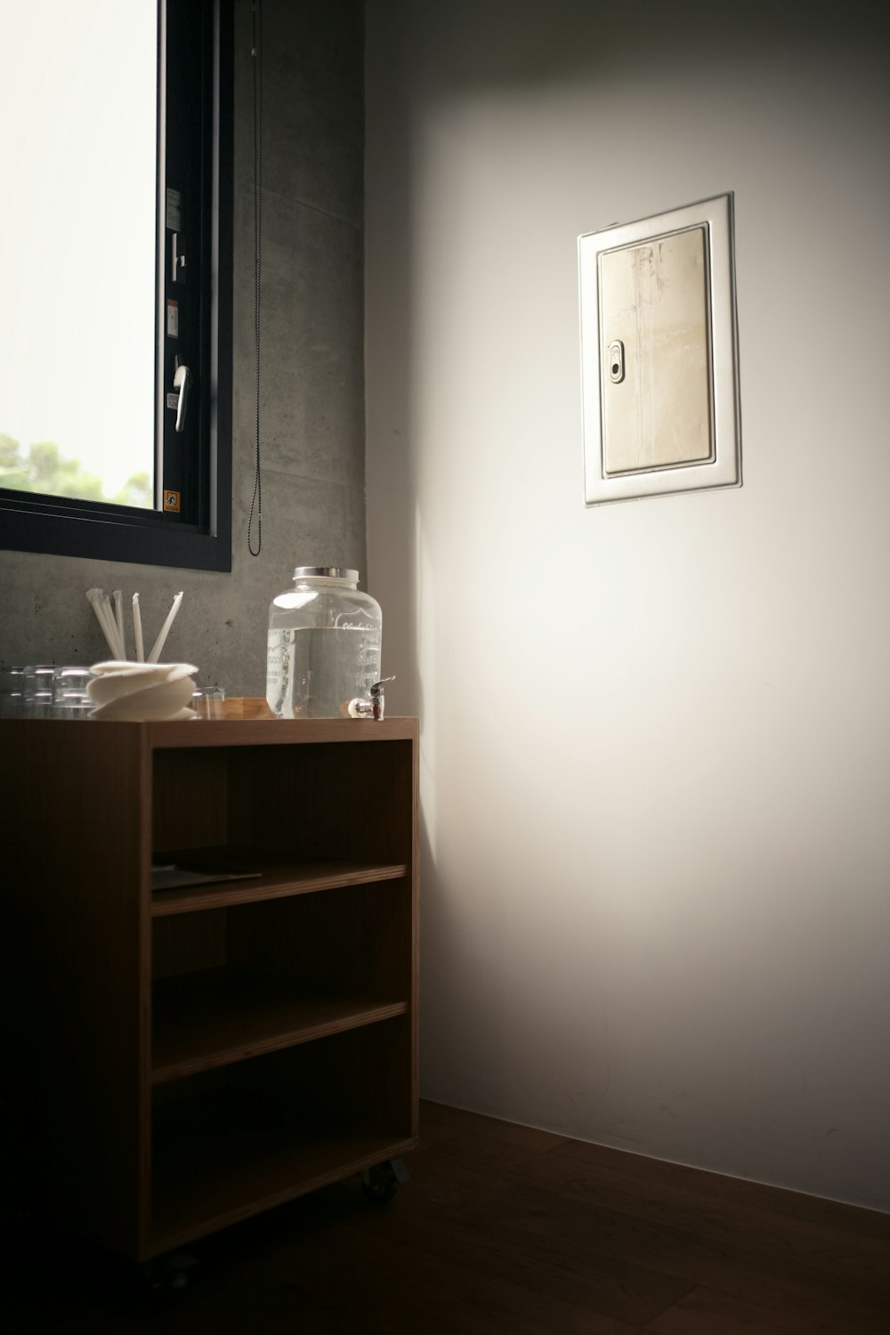 clear glass jar on brown wooden table