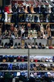 black and white shoes on white shelf