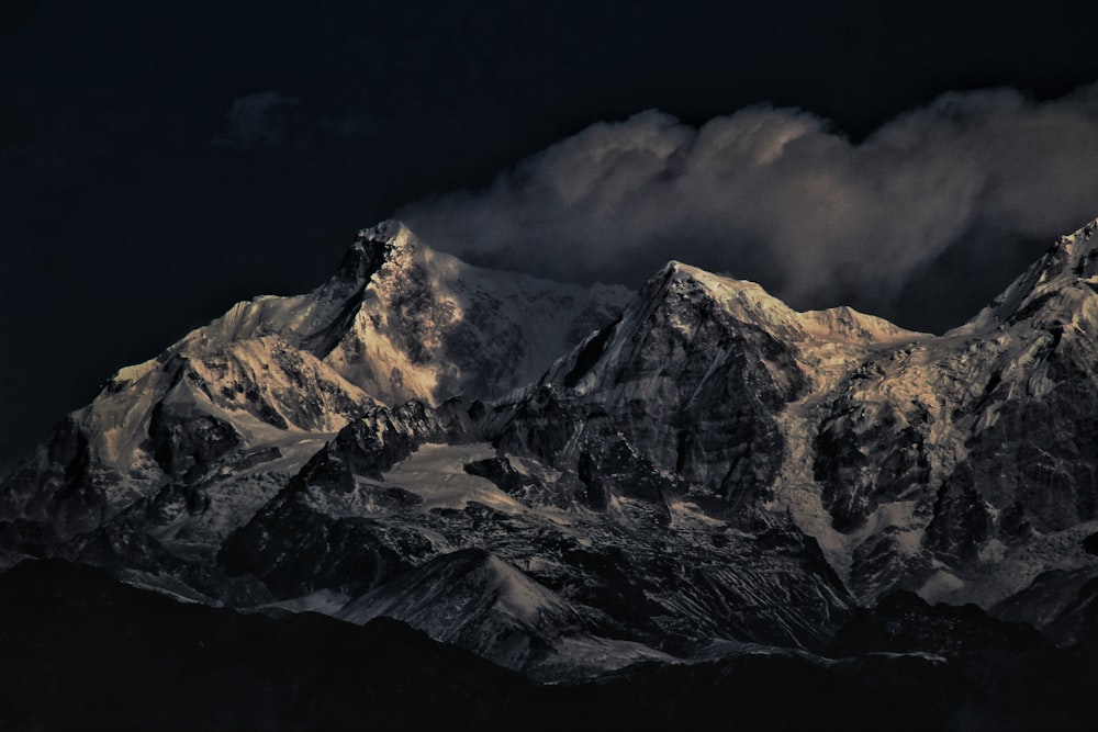 snow covered mountain during daytime