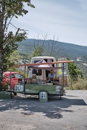 green and white van on road during daytime