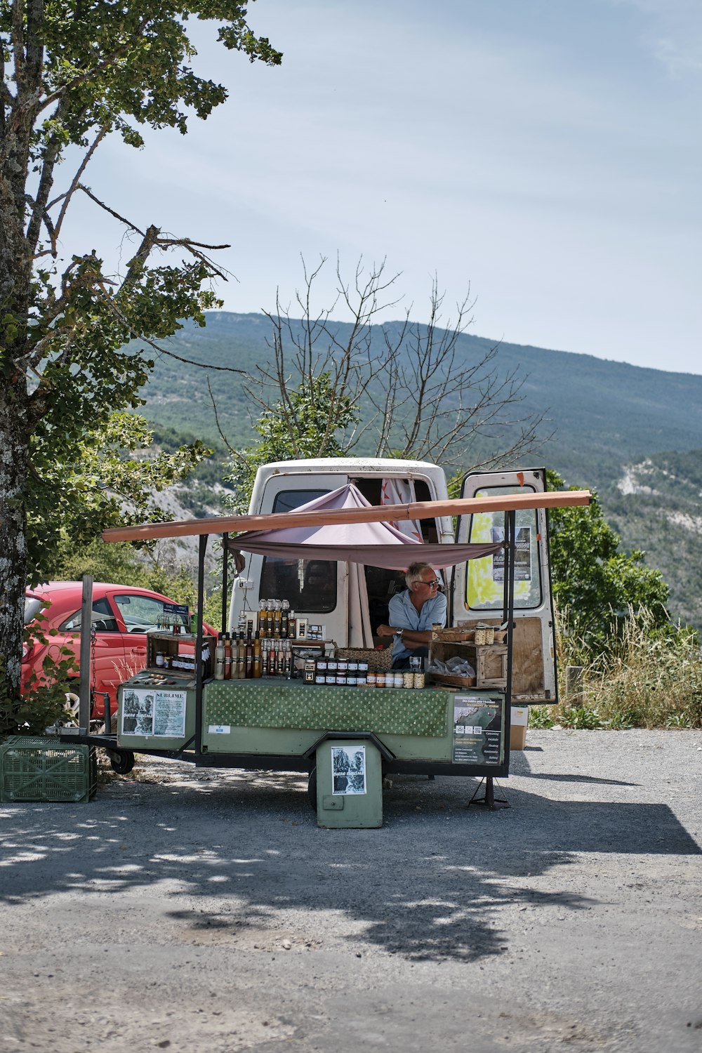 green and white van on road during daytime