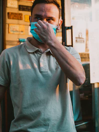 Close-up of a person adjusting a comfortable posture corrector in a bright medical setting.