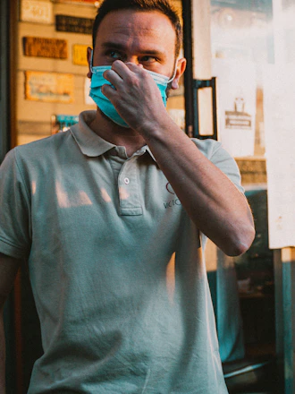 Close-up of a person adjusting a comfortable posture corrector in a bright medical setting.