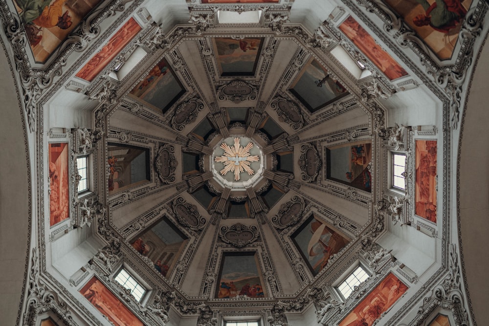 brown and white ceiling with glass windows