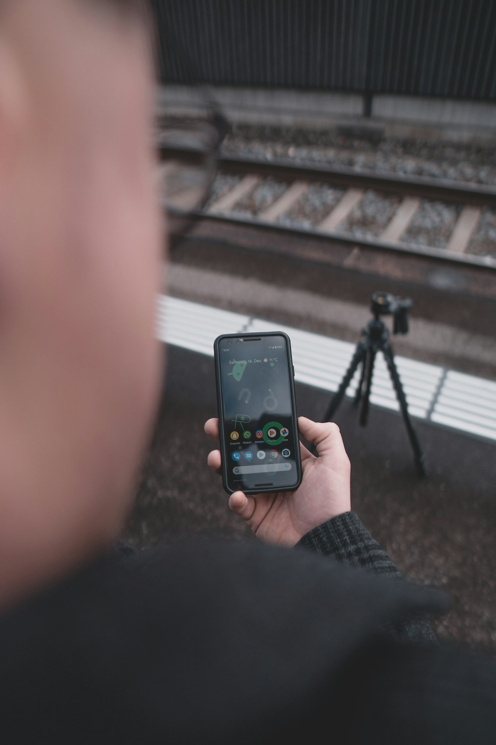 person holding black iphone 5