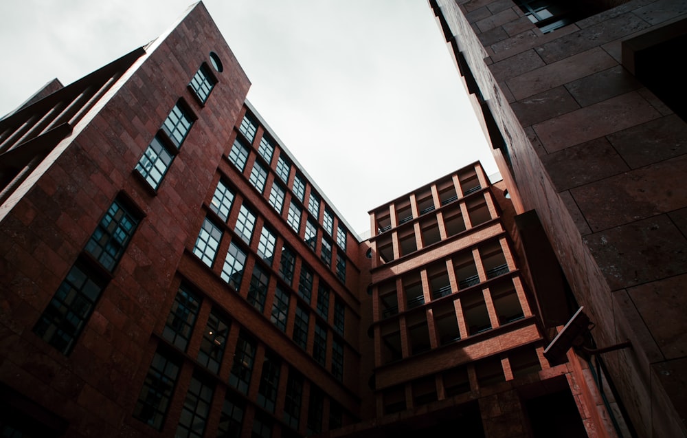 red concrete building under white sky during daytime