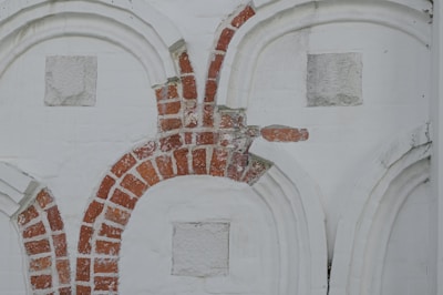 Completed brick wall with decorative patterns highlighting craftsmanship.