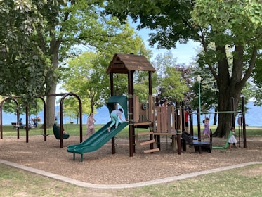 Playground with slide and climbing structure