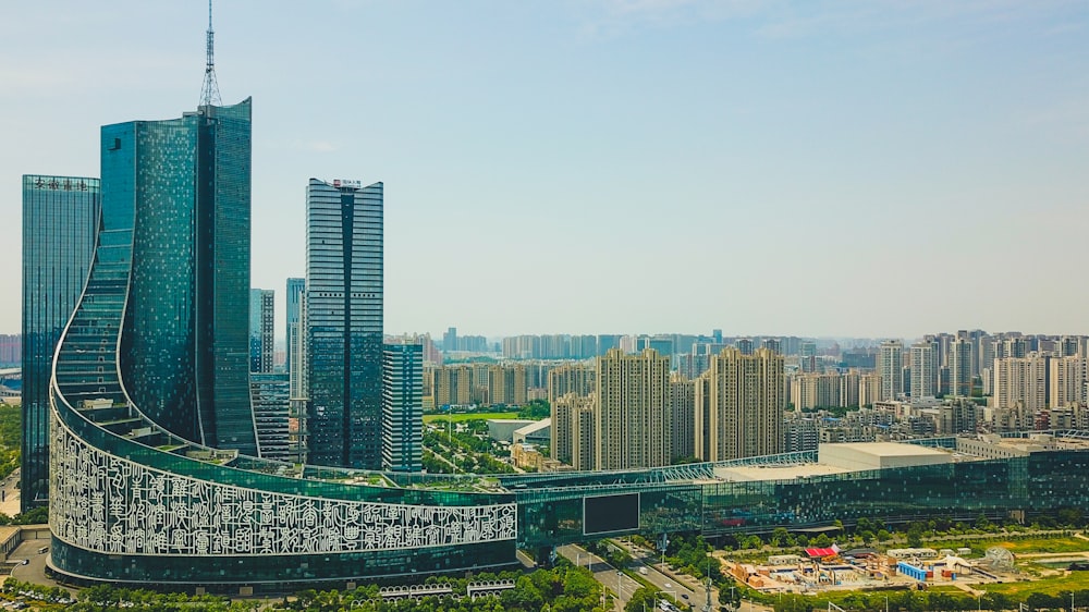 city skyline under blue sky during daytime