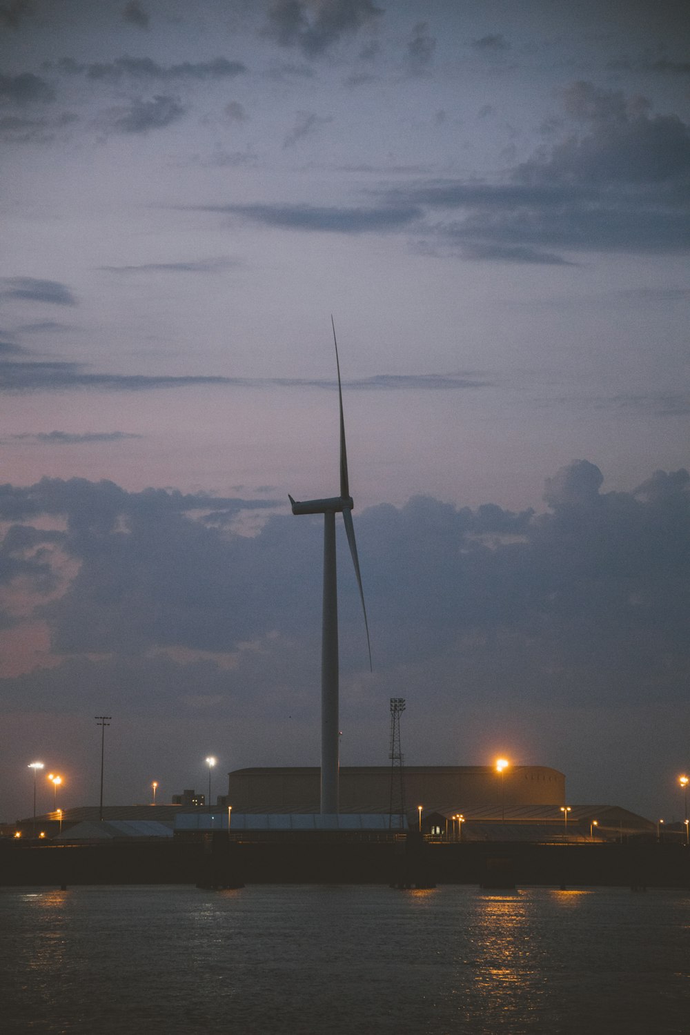 white wind turbine during night time