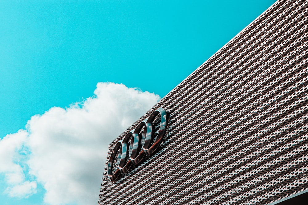 brown brick wall under blue sky during daytime